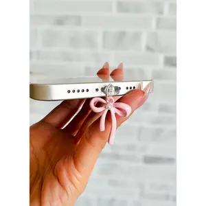 pink bow charge port charm