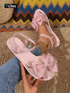 A pair of new large-size women's open-toe sandals with bow decoration, elastic slip-on design, suitable for outdoor wear, stylish, simple, comfortable, lightweight, casual, versatile flat sandals