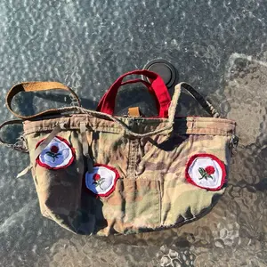 Upcycled Camo Canvas Tote Bag with Hand-Embroidered Red Rose Patches for Stylish Everyday Use