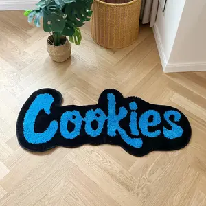 Blue Cookies Rug - Unique Design with Blue Text, Black Outline, and Decorative Pattern, Ideal for Home Decor