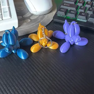 Articulated Balloon Animal Keychain - Vibrant Colors & Flexible Design for Easy Attachment