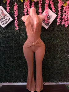 The Goddess Wrap Jumpsuit with Plunging Halter Neckline Sheer Draped Mesh Sash Metallic Gold Hardware Accent Hourglass Effect
