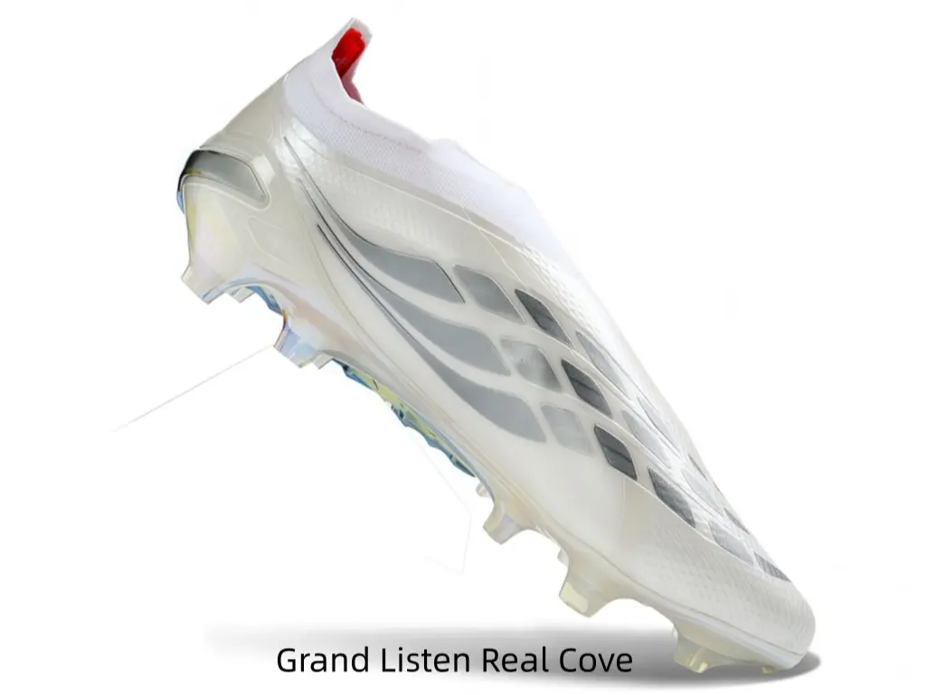 Laceless translucent white soccer cleats with silver geometric print and bright red heel trim