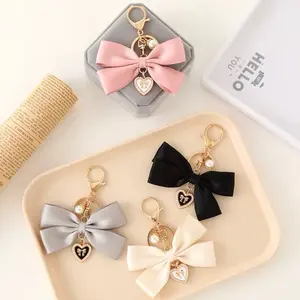 1pcs Bow Purse Keychain Key Chains Bow Keychains Purse Charms Bow Cute Keychain for Women Car Keys Purse Bag Handbags Girls Gift DIY Crafts Accessories White Pink Ribbon Pearl Decorated Elegant Style