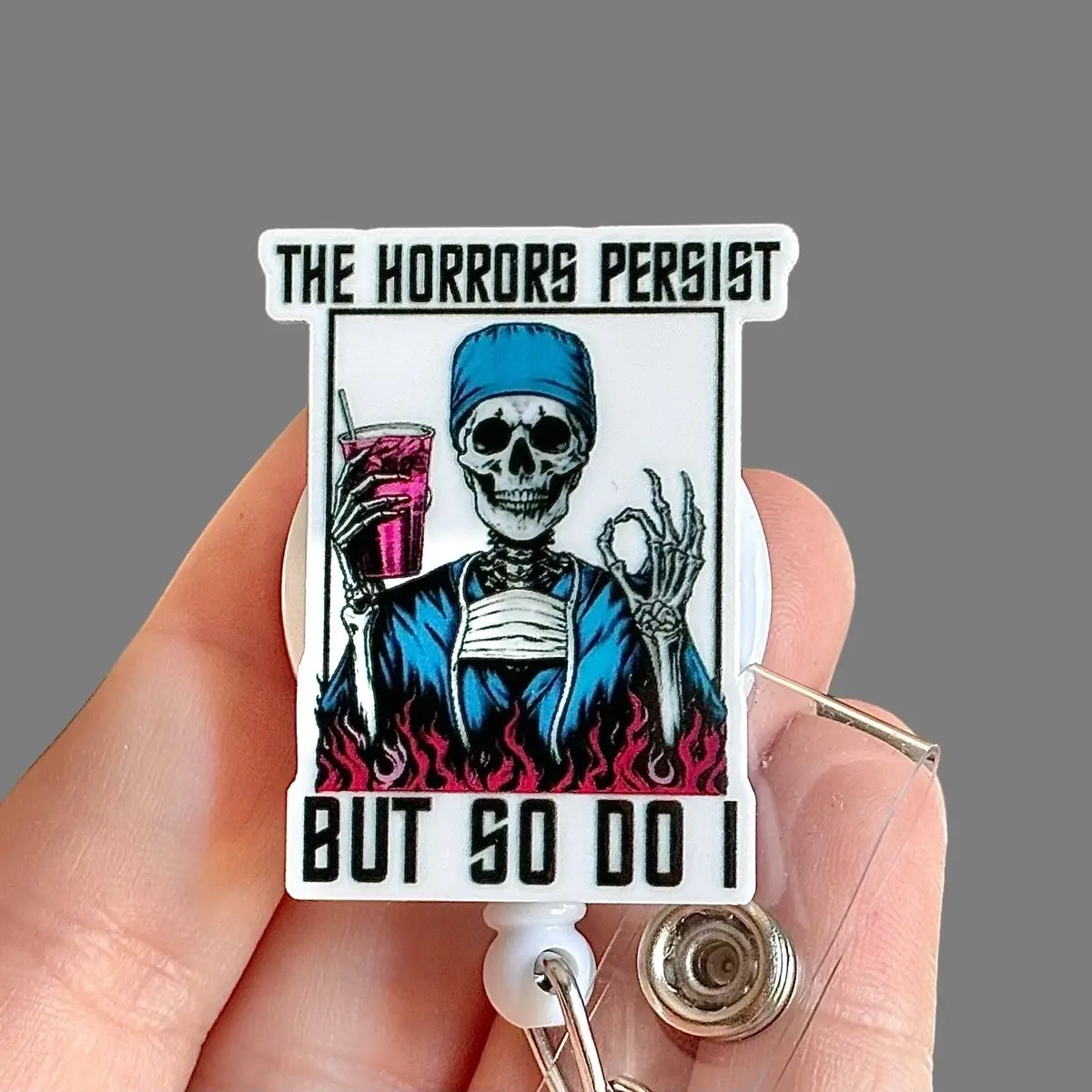 Glitter My Badge Skeleton The horrors persist but so do I badge reel for nurse and hospital workers. Badge clip Badge pull - Retractable swivel clip with a 360 rotation. Great gift for coworker.