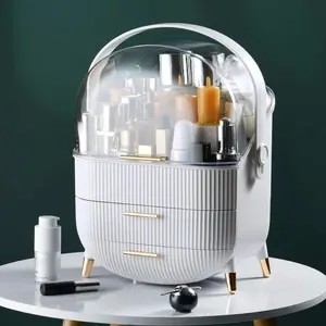 MASSY Egg Shape Oval Makeup Storage Box Countertop Portable Vanity Cosmetics Organizer Preppy with Gold Handles and Clear Lid