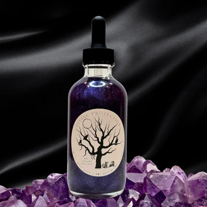Divine Protection Oil: aromatherapy oil, with natural carrier oils, hand-crafted, reiki infused, and charged with quartz