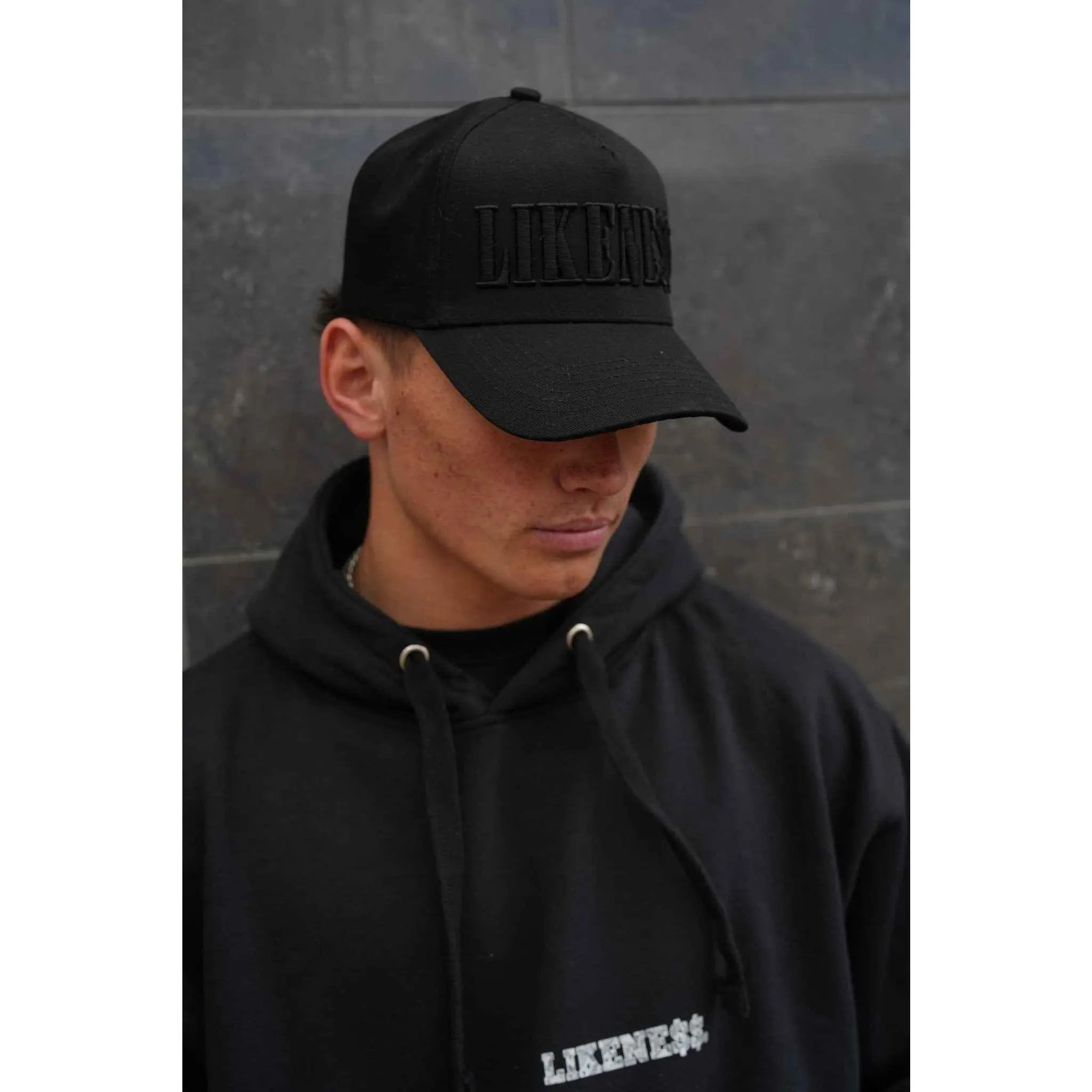 LIKENE$$ Black on Black 3D Puff Custom Embroidered Artwork 5-panel Cap with Seamless Front Panel & Adjustable Hook Loop Closure