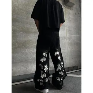 Y2K loose wide-leg jeans with cherry blossom embroidery, street-style retro denim jeans, women’s flower-embroidered jeans GARMENTARY