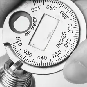 Spark Plug Gap Gauge Measuring Tool - Coin-shaped, Measuring Range 0.6 - 2.4 Millimeters. Spark Plug Specification Measuring Tool.