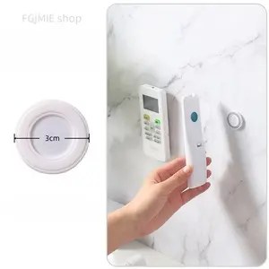 Includes shipping cost. 2-pack multifunctional round magnetic adhesive remote control holders for routers, wall-mounted adsorption home storage, strong magnetism, no drilling required mounting bracket.