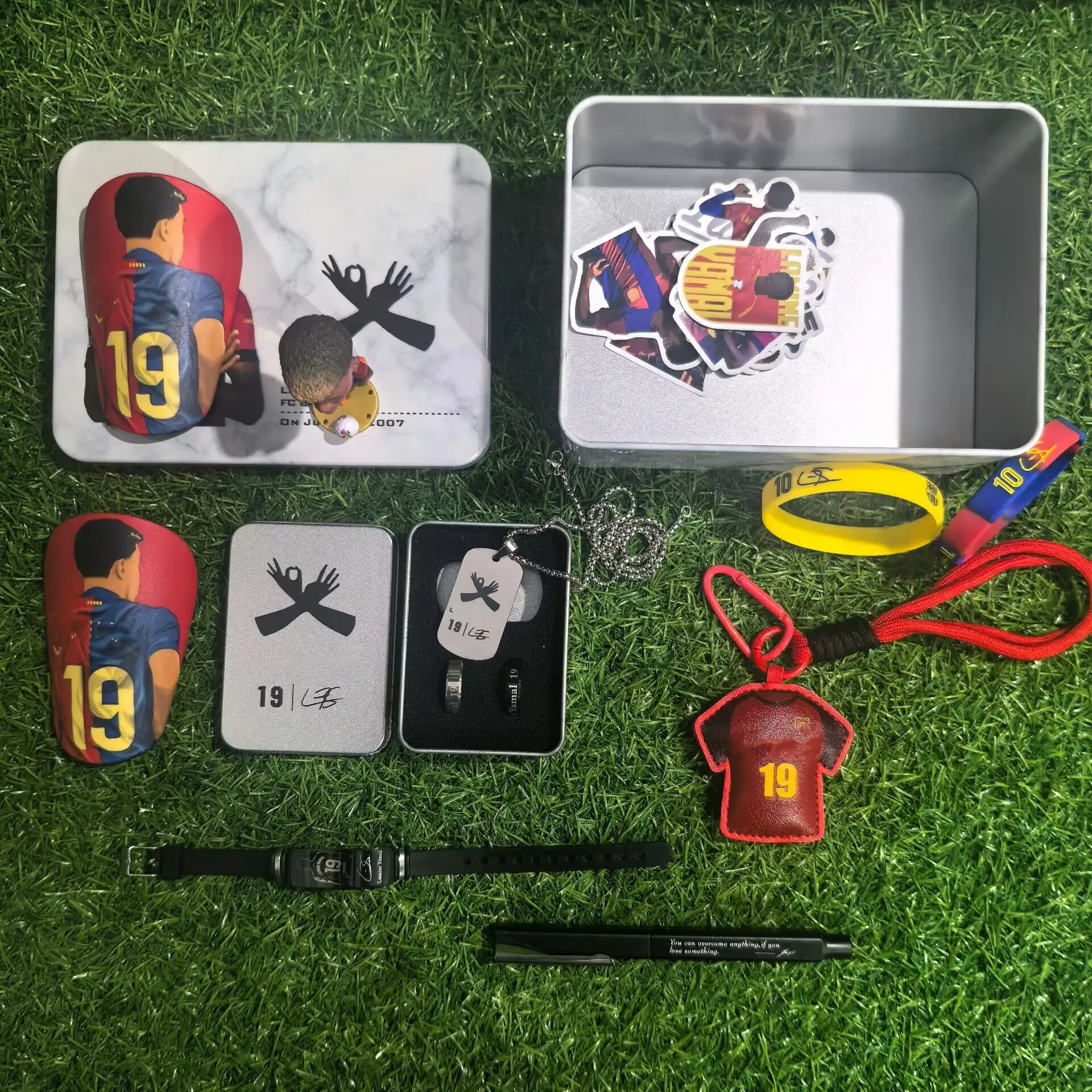 Soccer Star 19 Gift Bundle(1 gift box+1 Keychain+1 Figure+1 Pen+1 Necklace+2 Rings+1 Pair Of Mini Shin Guards+ 3-4 wristbands)