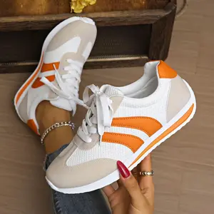 Breathable mesh retro sneakers with orange accents and a microfiber suede upper design; non-slip and comfortable, suitable for fitness, tennis, and running training. women
