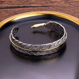 Vintage feather bracelet with adjustable opening for men and women, creative jewelry gift