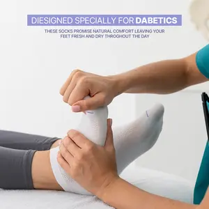 Comfello Diabetic Socks for Mens & Womens, Non-Biniding Circulatory Cotton Doctor Approved Cushioned Cotton Socks Seamless Prevents Holes and Swelling, White & Black Socks for Men (6, 12, 18 & 24 Pairs) 9-11 10-13 13-15