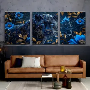 3-piece art series, aesthetic canvas prints of a leopard surrounded by blue flowers and golden plants, suitable for living room decoration, bedroom decoration, and office decoration