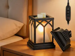 Black electric wax melt warmer lantern with timer and lid. Modern tart burner design, gently melts scented wax, perfect for fireplace and kitchen decor.
