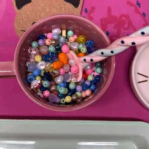 Scoops of beads and charms
