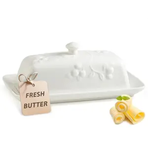 Keep your butter fresh with this lovely cherry-red ceramic butter dish.The lid and convenient knob make it easy to use, and it's big enough for any amount of butter.
