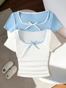 2-piece set of solid color casual short sleeved T-shirt Tailored Fit for young girls, with bow decoration and Bow Detail on the front chest, knitted fabric, versatile for all seasons, girls' clothing, machine washable and dry cleanable, Casual Tee Tops