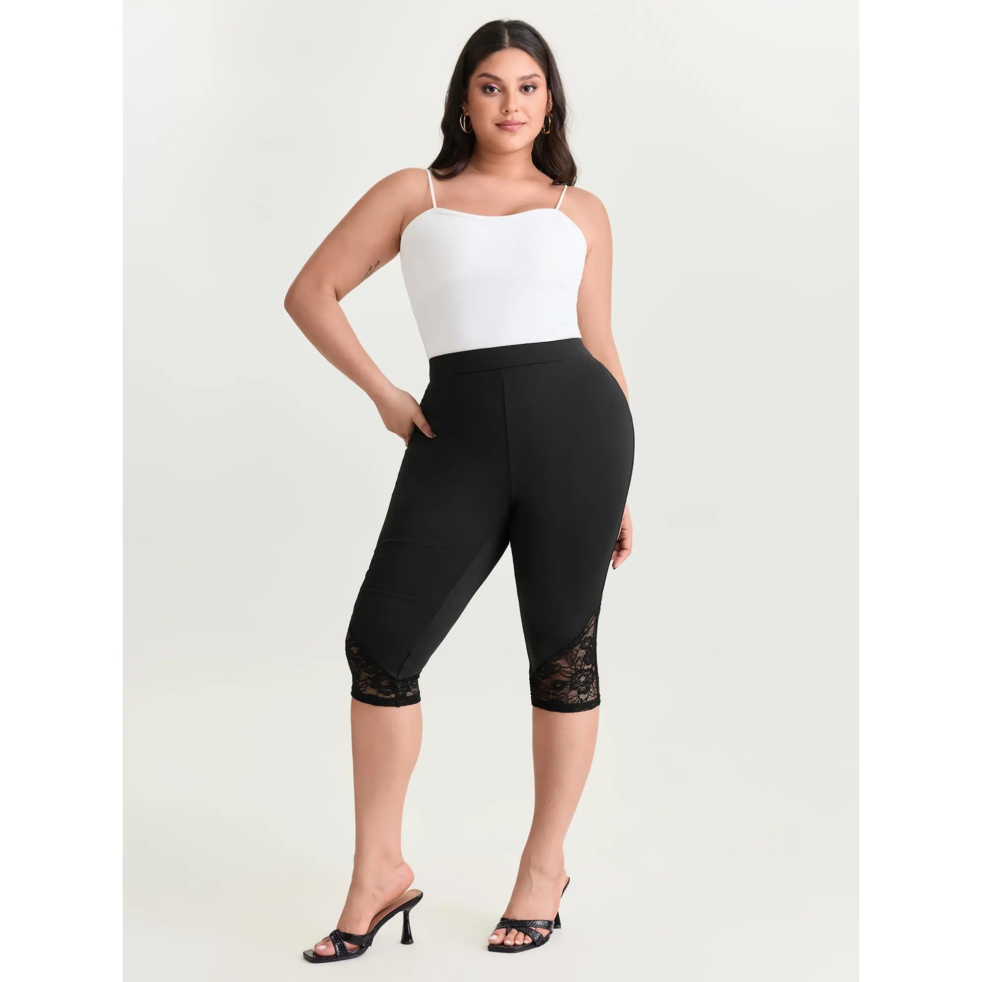 BLOOMCHIC Women’s Plus Size Minimalist Classic Stretch Lace Trim Cropped Leggings (M-6X) - High Stretch Nylon Blend Spandex-Elastane Solid Patchwork Bottom, Breathable, Hand Wash, Casual Everyday Basic, Summerfinds, Comfy, Plain Capri Leggings