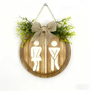 Rustic-style toilet sign, featuring a simple round hanging ornament adorned with charming leaves. An ideal choice for home bathrooms and an excellent decorative piece for outdoor toilets. A whimsical and imaginative decorative item.