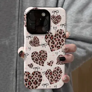 This durable, shock-absorbing, glossy 2-in-1 phone case features an all-over leopard print, heart, and bow design. It's compatible with iPhone 17, 16, 15, 14, 13, 12, 11, X, and Samsung models. A perfect holiday gift for friends or family.