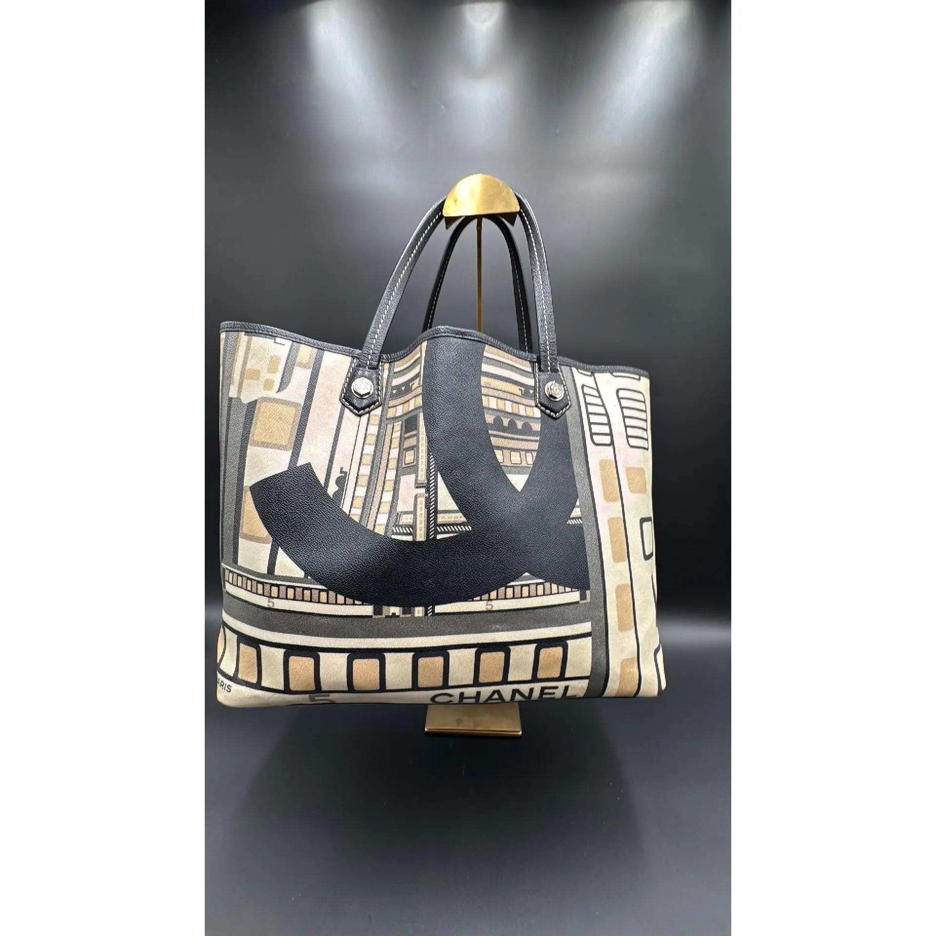 Pre-owned CHANEL Leather Luxury Bags & Accessories Central Station Collection 2006 2008 Shopping Tote Bag, Black/White Date Code: 11026244. Entrupy ID: 4B76W8V.