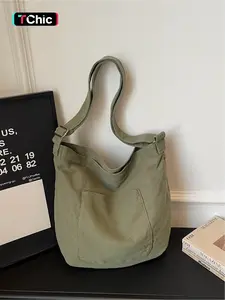 Minimalist tote bag, Everyday tote bag, large capacity with simple silhouette, front pocket design, adjustable wide shoulder straps, can be worn on one shoulder or under the armpit, can hold computers, books, commuting, school, travel