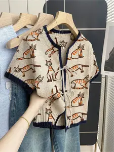 Women's khaki bohemian vacation short-sleeve knit top. Loose round neck, contrast cartoon cat print, front tie and contrast piping. Comfortable for spring & summer casual wear. Knitwear Womenswear
