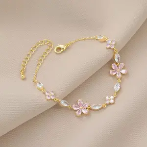 14K Gold Plated Pink Flower Bracelet for Women Sparkling Cubic Zirconia Cherry Blossom Chain Adjustable Dainty Floral Jewelry for Everyday Wear Valentine's Day Mother's Day Birthday Gift