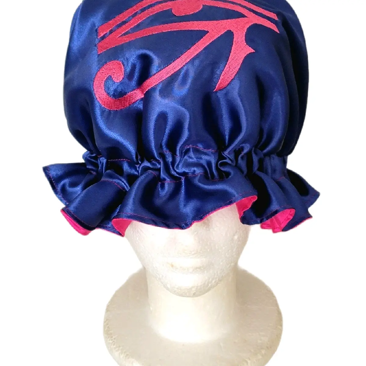 Handmade satin on satin reversible bonnets.