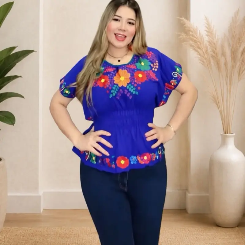 Blusa estilo mariposa bordado flor