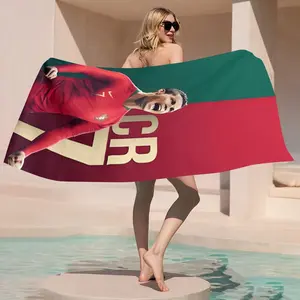 Cristiano Ronaldo, the Portuguese football star, celebrates his goal with passionate enthusiasm with this sporty beach towel Design Beach Towel made of soft, absorbent microfiber, suitable for swimming, surfing, and camping.