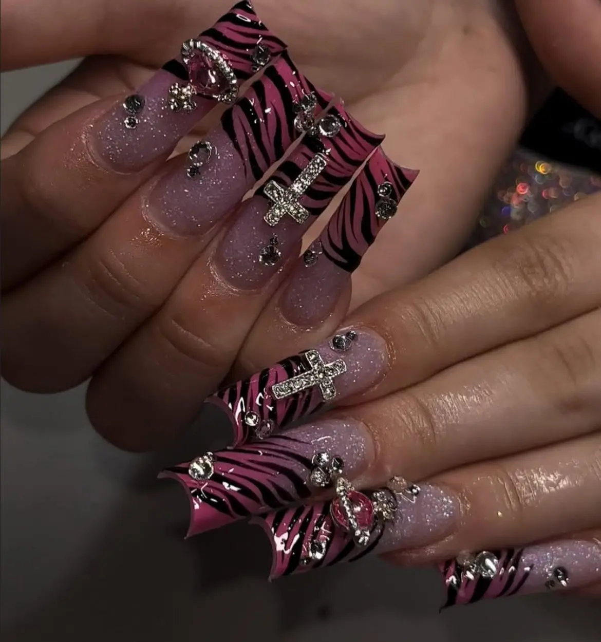 Y2K McBling Flare Press-On Nails | Hot Pink & Black Zebra Print | Detailed Rhinestone Cross & Heart Charms | Sparkly Glitter Base | High-Quality Unique Retro Punk Handmade Set