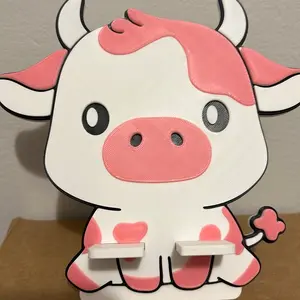 Highland Cow Phone Stand - Adorable Pink and White Design for Secure Phone Placement