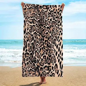 A leopard print beach towel, Microfiber Towel, Travel towels, suitable as a sunbathing mat, temporary changing shawl. Lightweight, versatile, perfect for seaside travel