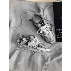 Men’s casual sneakers featuring an artistic cross pattern, vintage details, urban style, trendy design—stylish and comfortable shoes