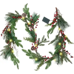 6-foot Pre-strung Artificial Christmas Wreath with Lights Features 20 LED lights, battery-powered Includes pinecones, red berries, and pine needle accents Illuminated mantelpiece holiday decoration