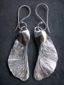 Retro Textured Silvery Color Irregular Leaf-shaped Earrings, Creative Ethnic Accessories, Suitable for Daily Wear, Parties and Vacations.