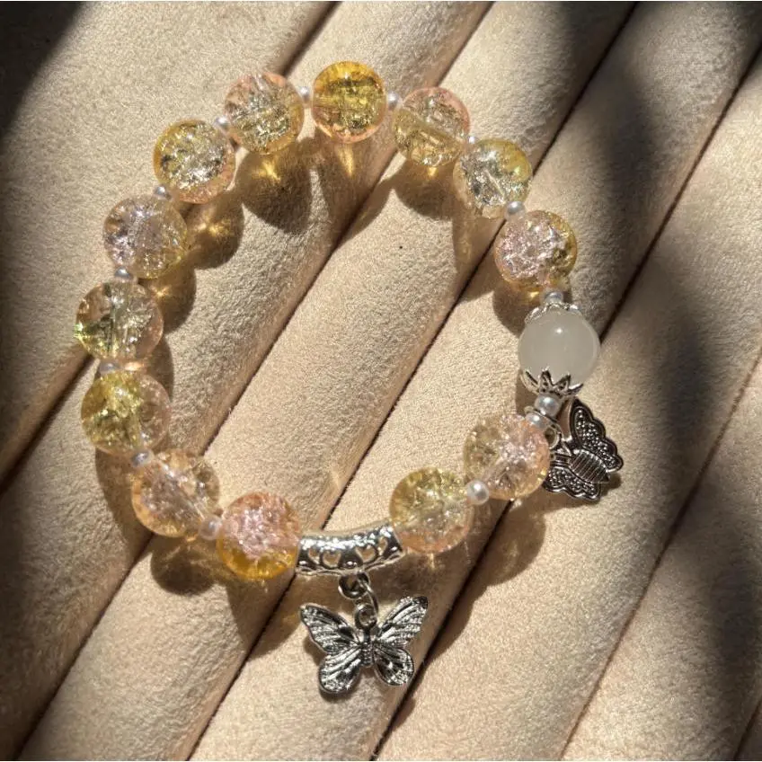 Pink and yellow double butterfly pearl beaded brac