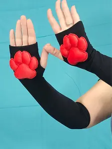 Red Mochi Stuffed Paw Pad on Black Gloves