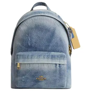 COACH Taylor 27 Denim Backpack with Logo in Gold and Light Indigo for Women