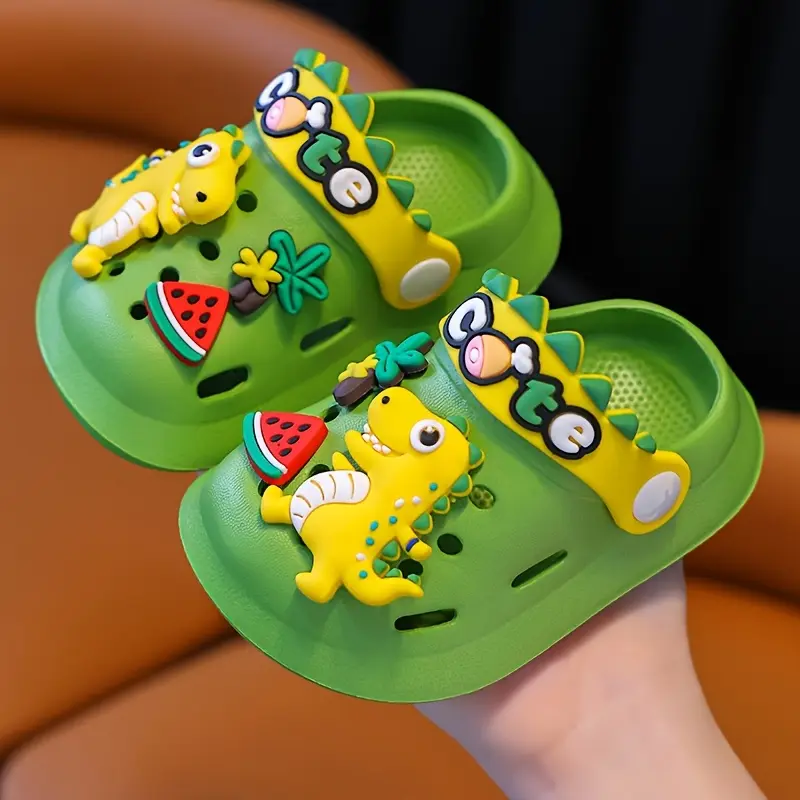 Youngsters' Cute Dinosaur Cartoon Clogs - Green & Yellow EVA Sandals for Boys and Girls, Fun Beach and Indoor Slippers with Adorable Dinosaur Charms, Youngsters Fun Footwear |               Cartoon Style Sandals |               Durable Youngsters Sandals