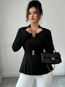 A fashionable black toned waist cinched long sleeve suit jacket for women, with a Chic waist cinched design that is not too picky. The fabric has a drape that is suitable for commuting to work, shopping, and outdoor wear