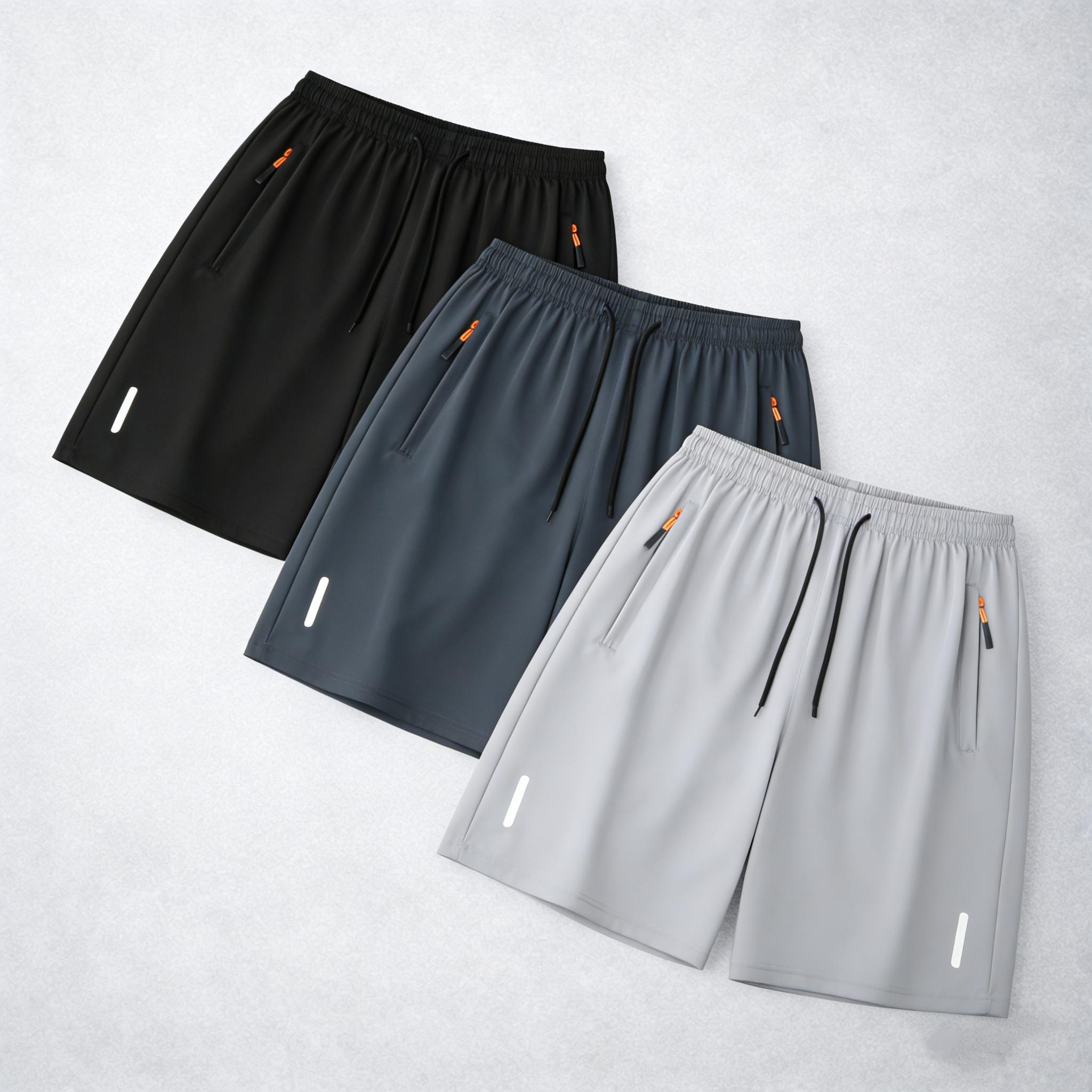 7-pack men’s ice silk quick-dry athletic shorts featuring zippered pockets and contrasting zipper head design; breathable, lightweight ice silk summer shorts for fitness, running, and casual wear—an essential for workouts and comfortable for home wear in