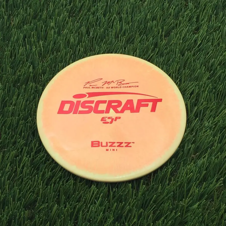Discraft ESP Mini Buzzz Mini with Paul McBeth - 6x World Champion Signature Stamp - 61.3g - Yellow Rimmed Orange