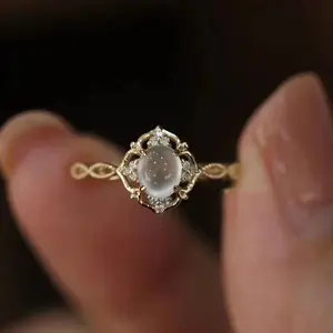 Vintage Flower Halo Ring Featuring an Oval Cabochon Moonstone, Designed for Women. Suitable for Weddings, Daily Wear, Or As a Birthday And Anniversary Gift for Her