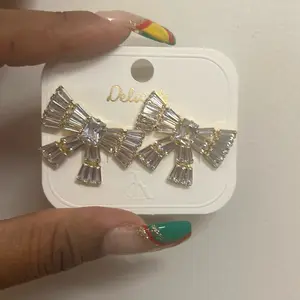 Delicate Charm Bow Earrings - Featuring Multi-Tiered Design - Punk Style Accessory
