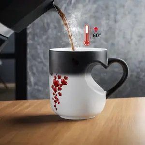 New 2026 color-changing ceramic mug with heart-shaped handle, heat-sensitive color-changing red heart-shaped coffee mug for both hot and cold use, perfect for Valentine's Day, Christmas, and birthday gifts.